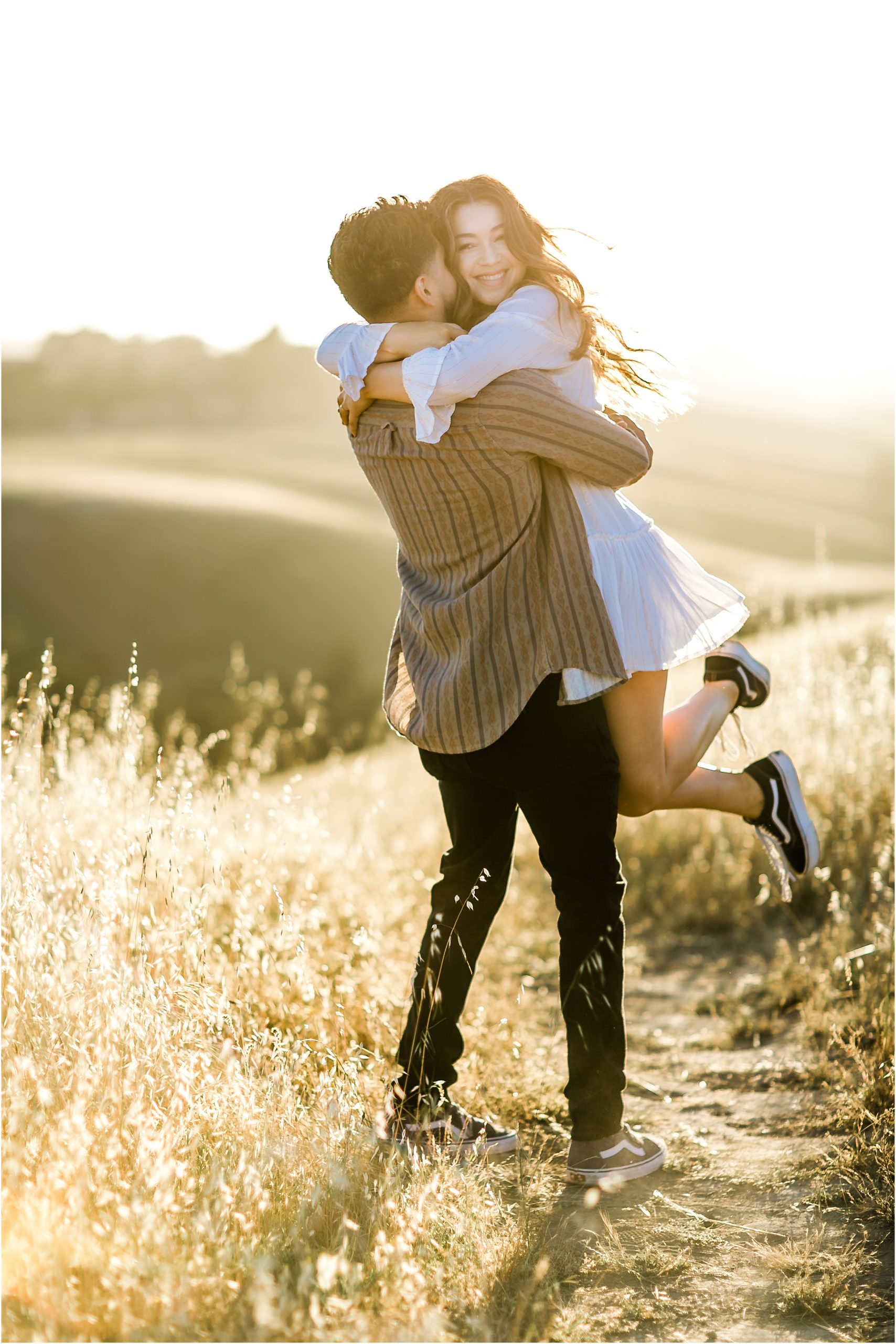 fun and outgoing couples session during the summer at helen putnam regional park