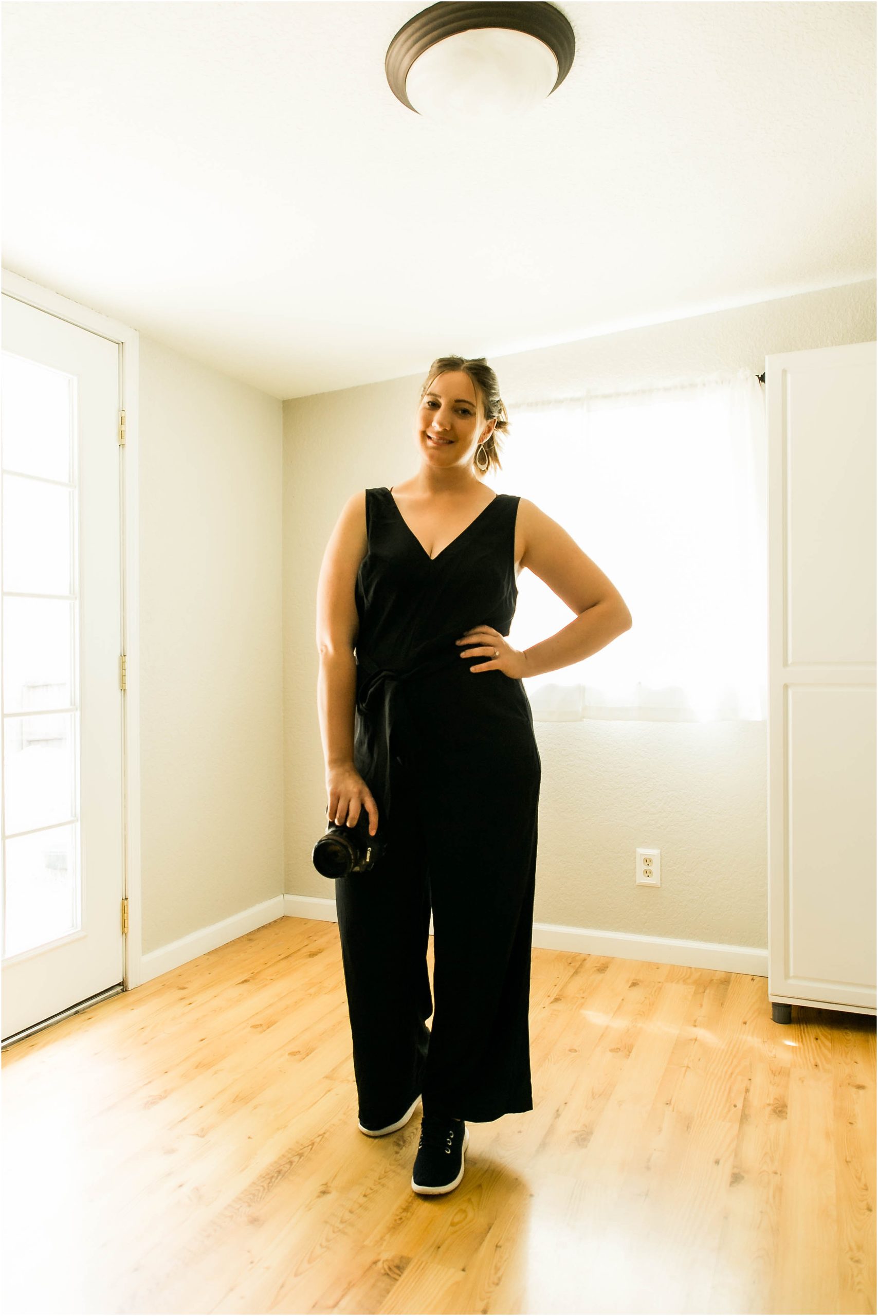 all black jumpsuit for wedding photographer